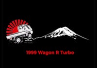 a truck with the words wagon r turbo and a mountain in the background