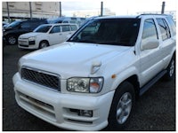 a white truck with a sold sign on it