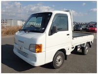 a white truck with a sold sign on it