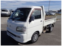 a white truck with a sold sign on it